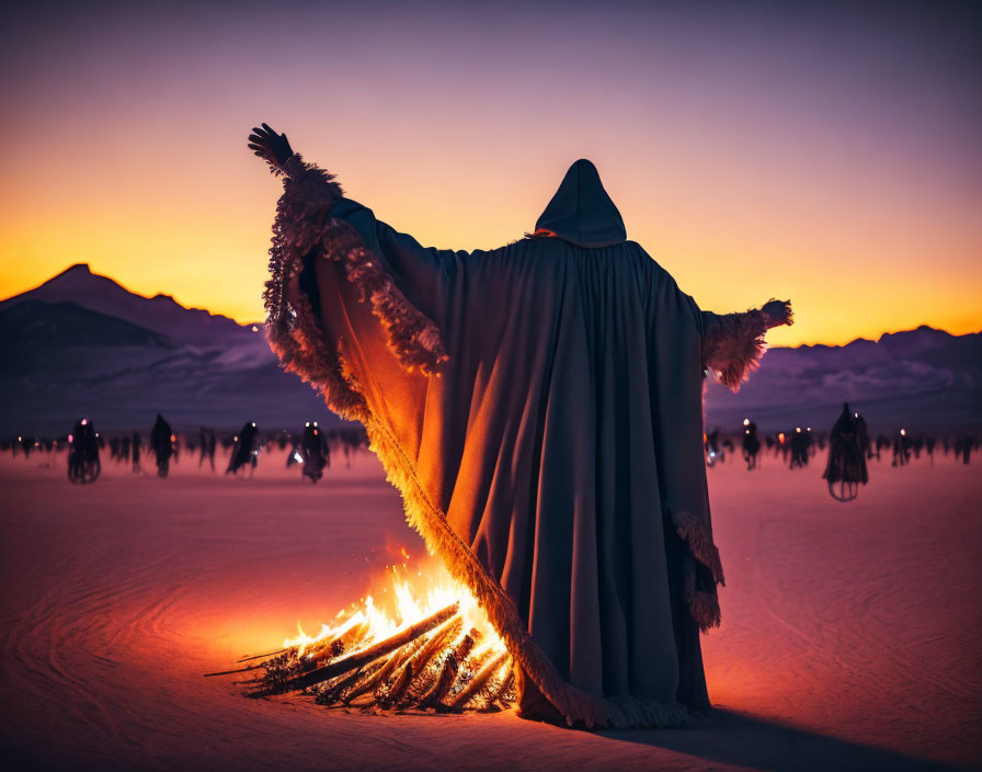 Mysterious figure at desert bonfire with silhouettes at dusk