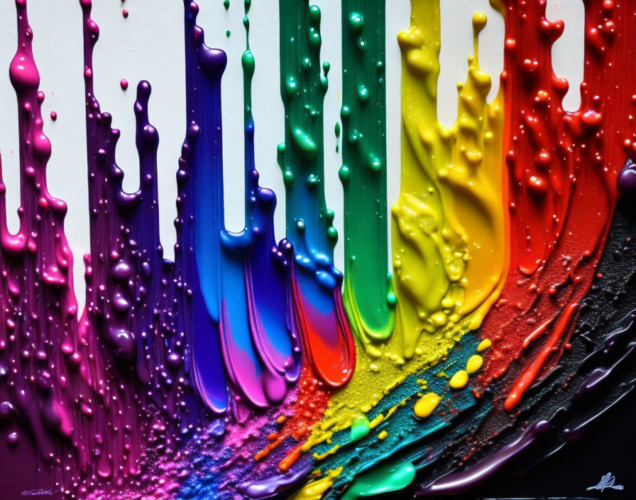 Vibrant paint splatters form dynamic rainbow pattern