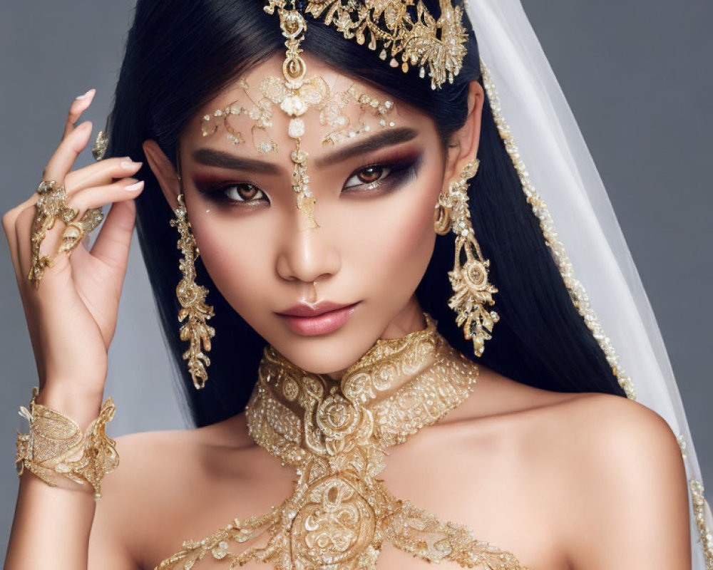 Elaborate Gold Jewelry and Dramatic Makeup on Woman