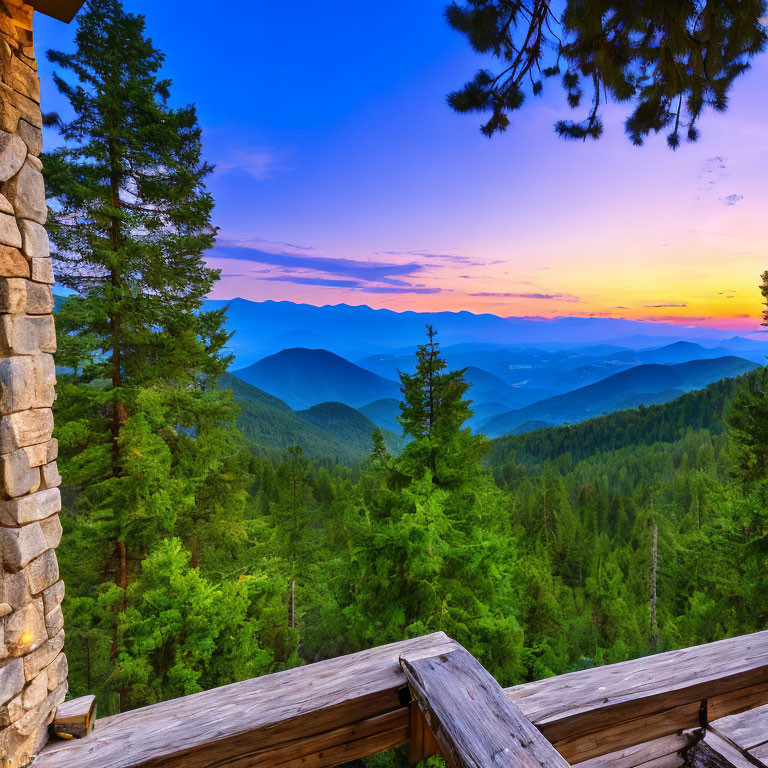 Wooden Balcony Overlooking Misty Mountains at Sunset