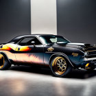 Black Muscle Car with Flame Decals and Gold Rims on Lightning Background