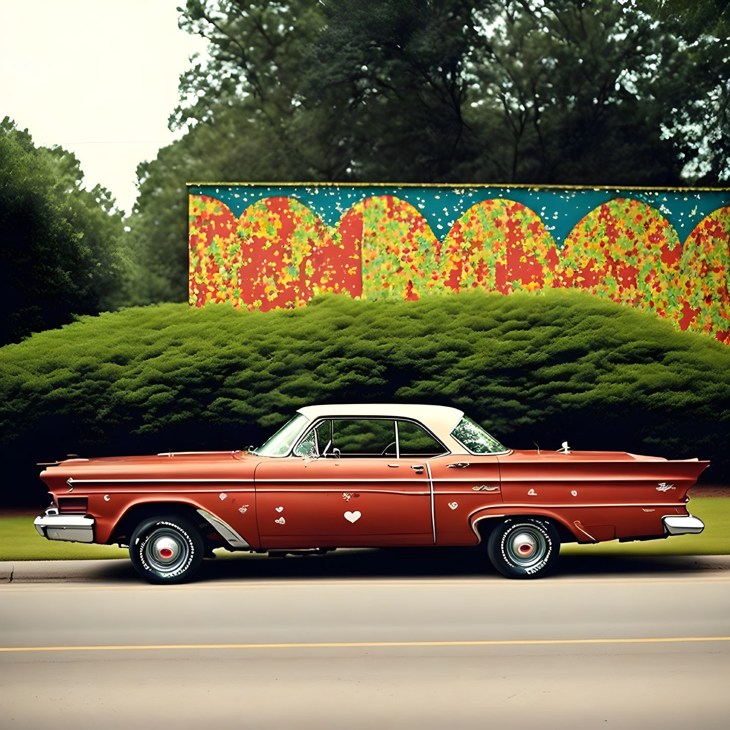 Vintage Red and White Car Parked Near Colorful Mural