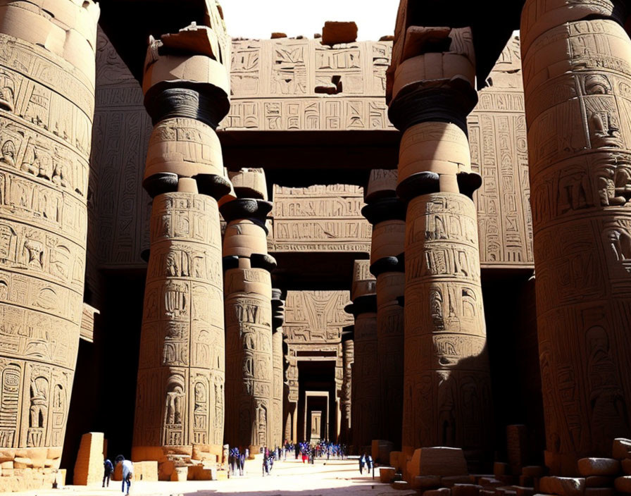 Ancient Egyptian temple with grand hieroglyphic columns and tourists.