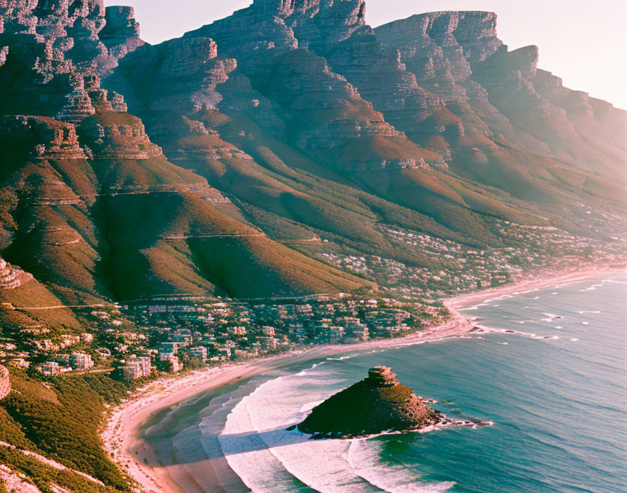 Scenic panoramic view of rugged coastline at sunset