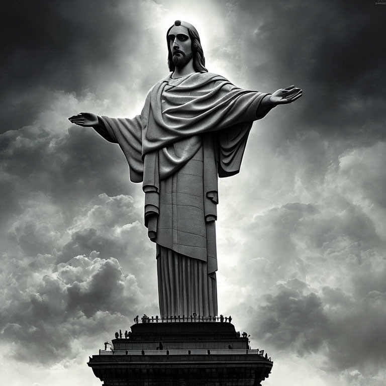 Giant Christ the Redeemer statue under cloudy sky