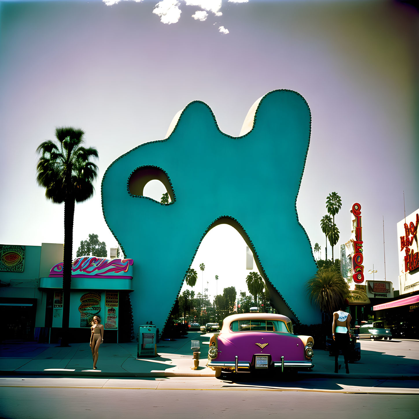 Retro scene with abstract turquoise sculpture, vintage car, and palm trees