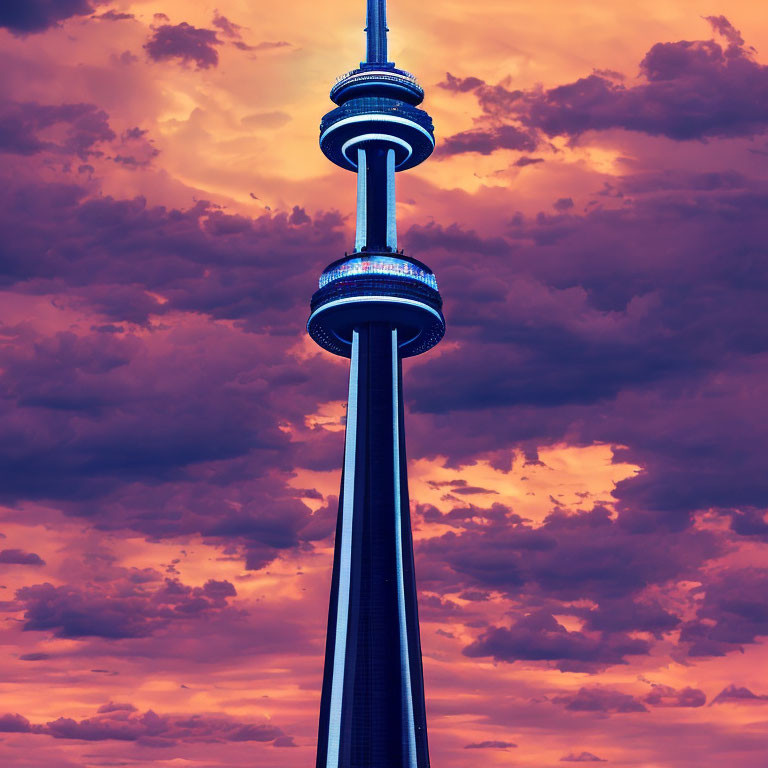 Iconic CN Tower silhouetted against colorful dusk sky with blue edge lights