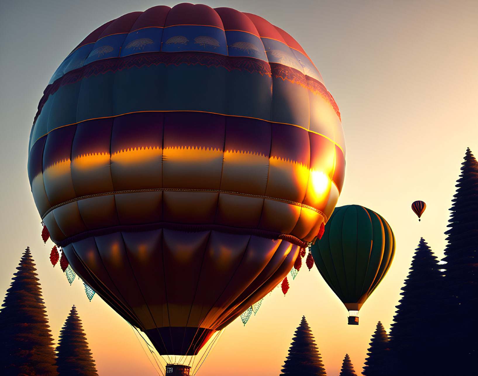 Colorful hot air balloons over forest at sunset with warm light