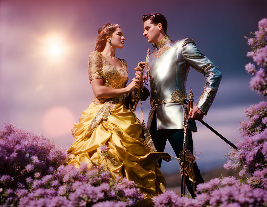 Medieval-style man and woman pose in field of purple flowers at dusk