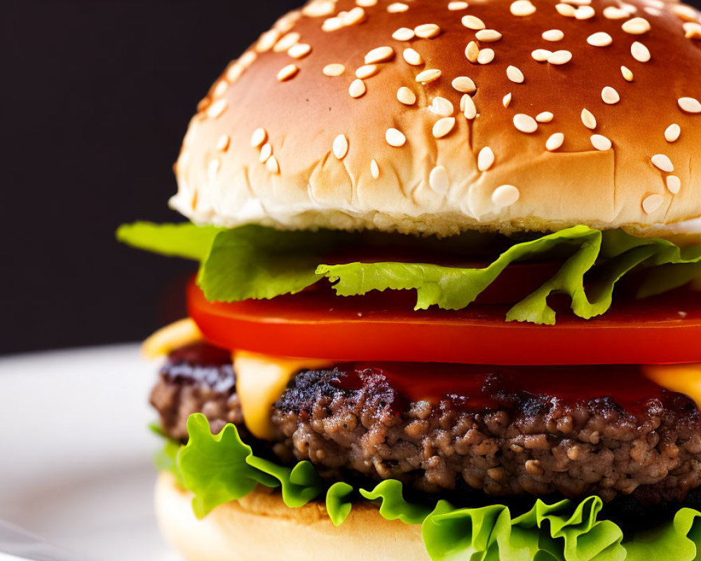 Sesame bun cheeseburger with lettuce, tomato, cheese, beef patty, and condiments