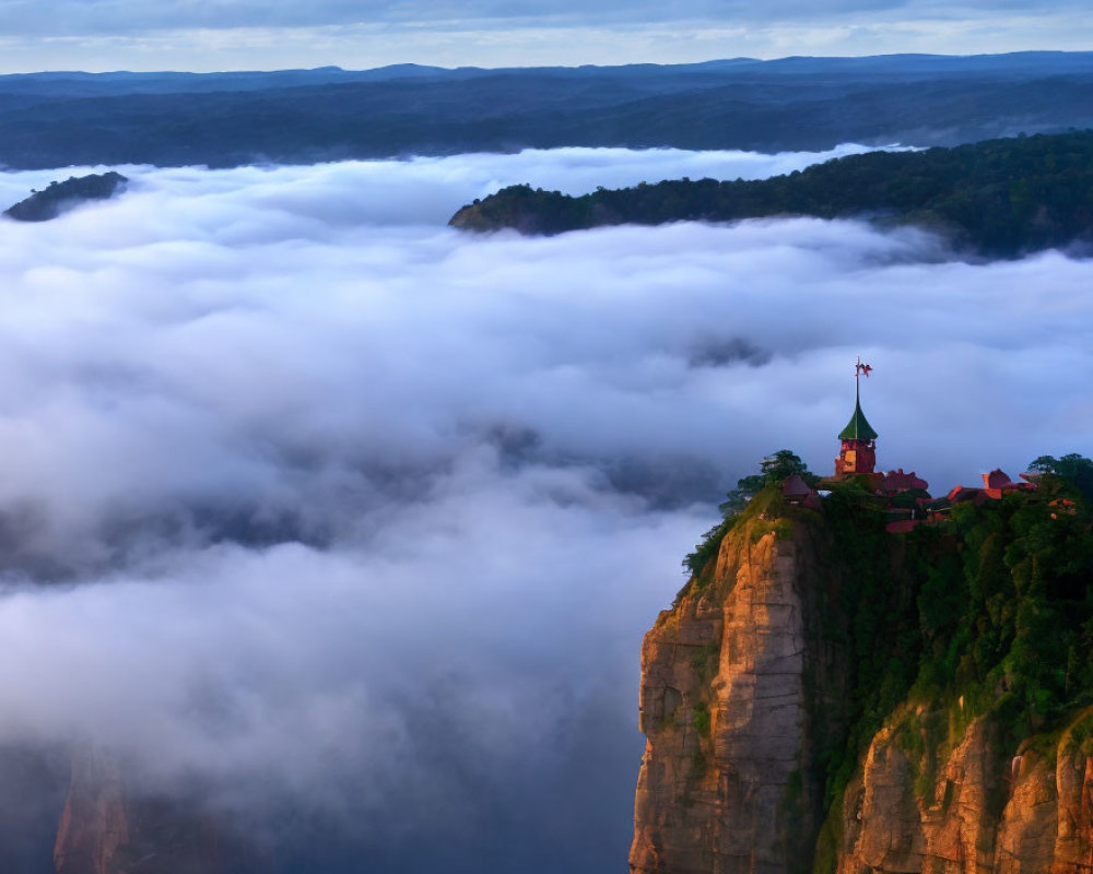 Castle-like Building on Cliff with Green Spire Overlooking Cloud-Covered Forestscape