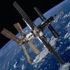 International Space Station Orbiting Earth with Extended Solar Panels