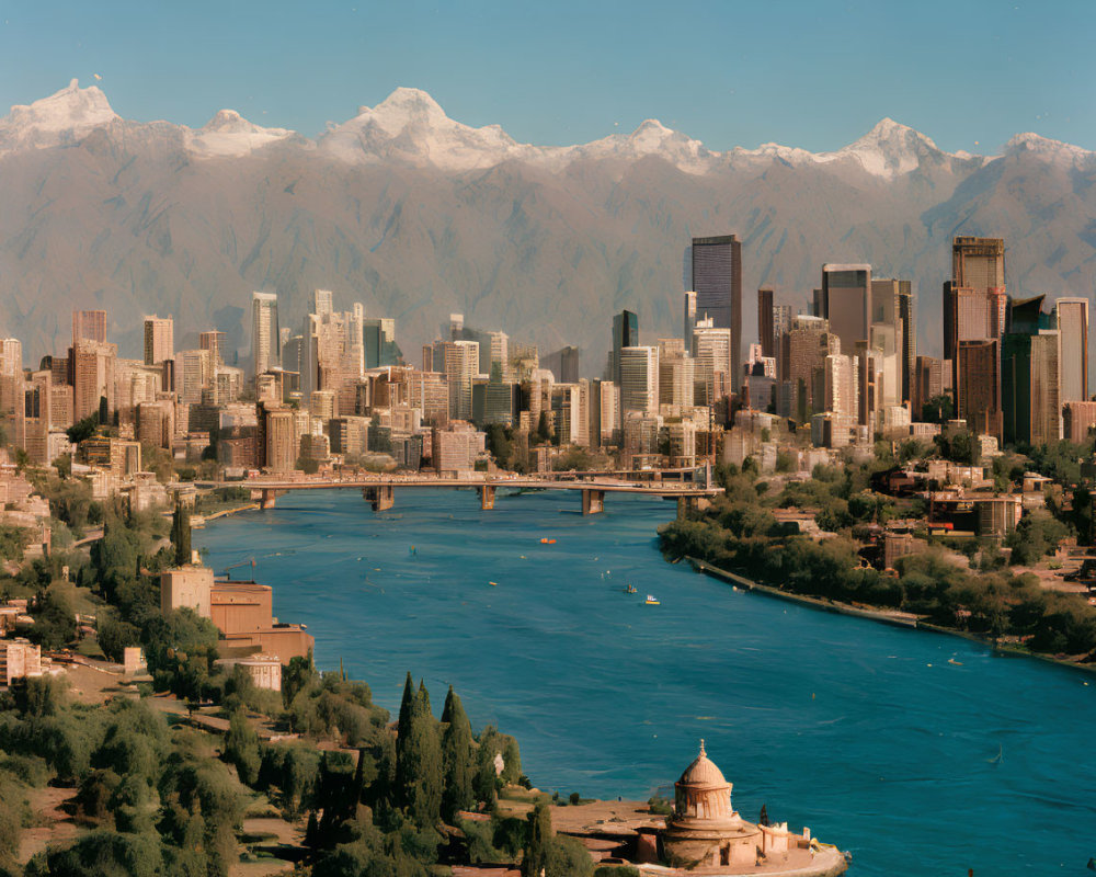 Modern cityscape with skyscrapers, river, trees, and mountains.