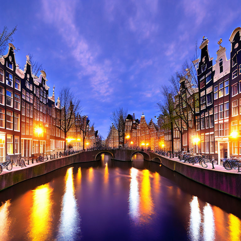 Serene Amsterdam Canal at Twilight with Dutch Buildings and Bicycles