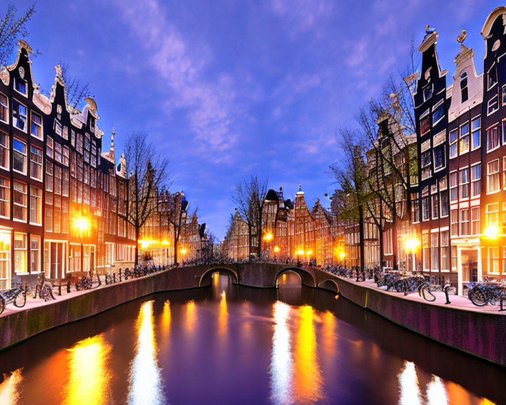 Serene Amsterdam Canal at Twilight with Dutch Buildings and Bicycles