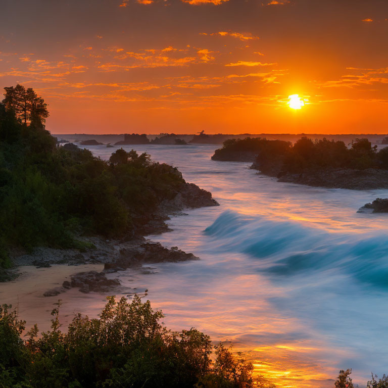 Vibrant sunset over coastal scene with crashing waves and fiery sky