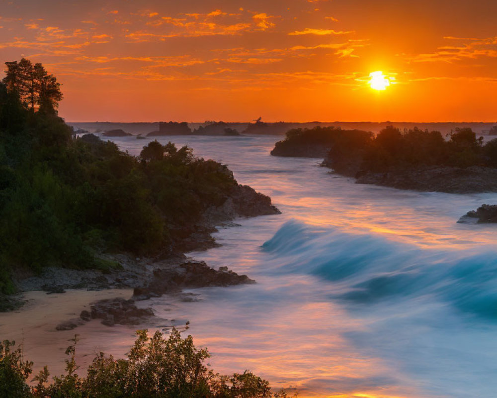 Vibrant sunset over coastal scene with crashing waves and fiery sky