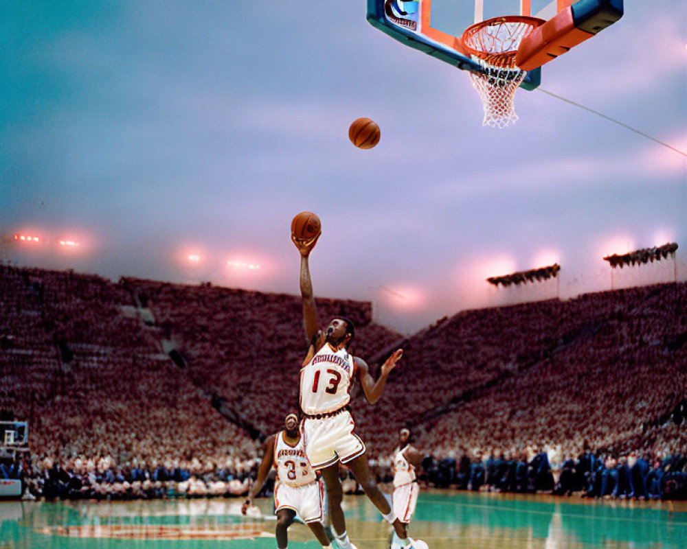 Basketball player in white and red uniform number 33 attempts layup in packed arena