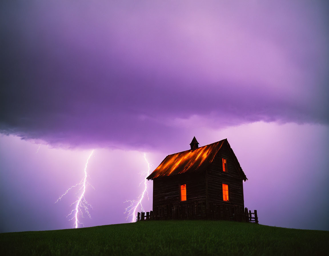 Wooden cabin on hill under stormy purple sky with lightning strikes