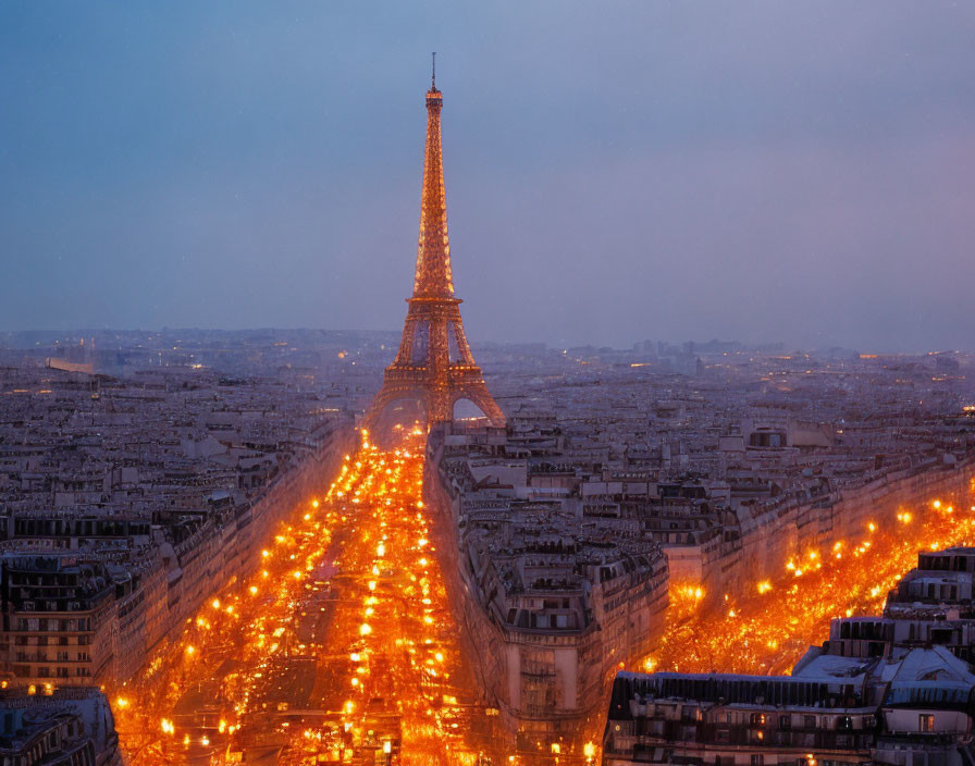 Twilight aerial view of illuminated Eiffel Tower in Paris