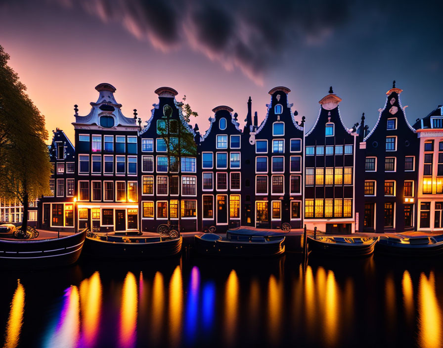 Twilight scene of Dutch houses by canal with vibrant reflections