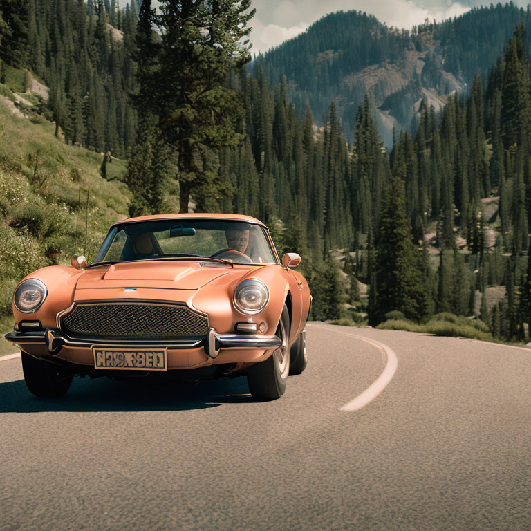 Vintage Orange Sports Car Driving on Mountain Road with Greenery & Peaks