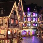 Vintage-style illustration of people in coats on quaint street with lit-up shops at nighttime