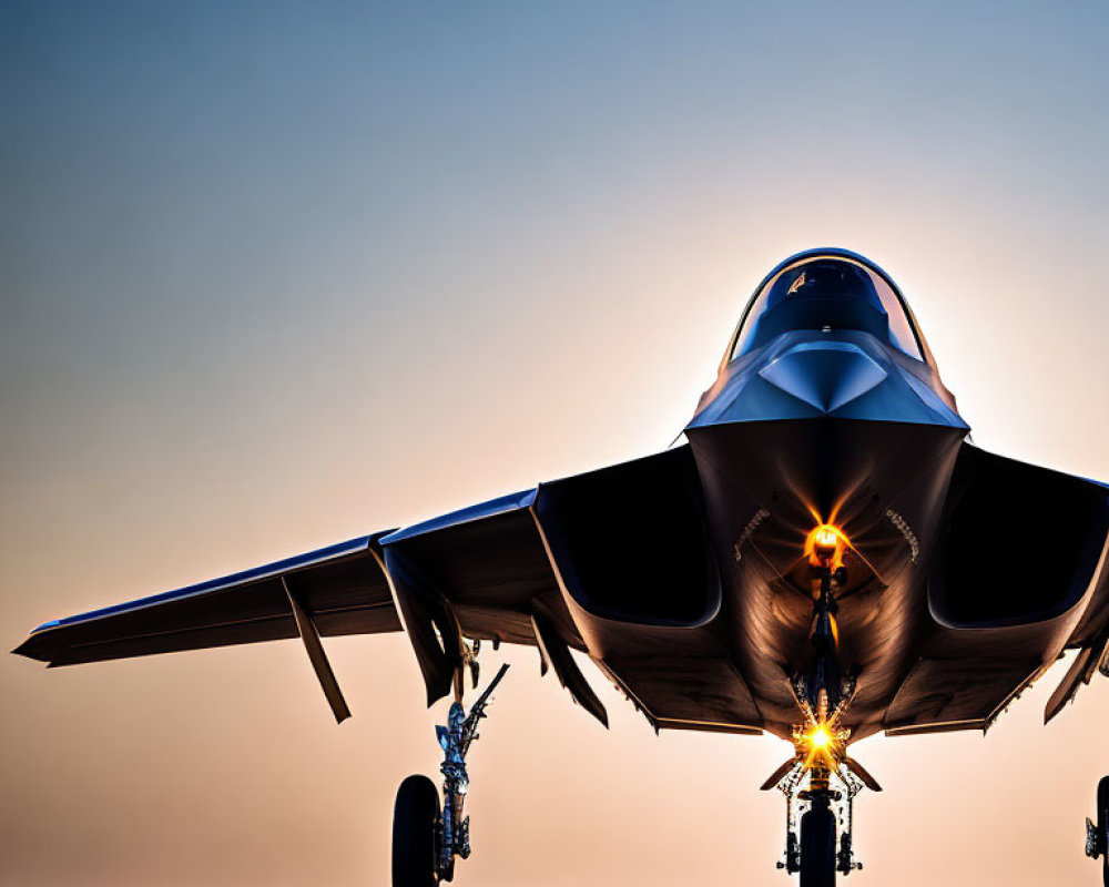 Military fighter jet silhouette at dusk with glowing engine exhaust