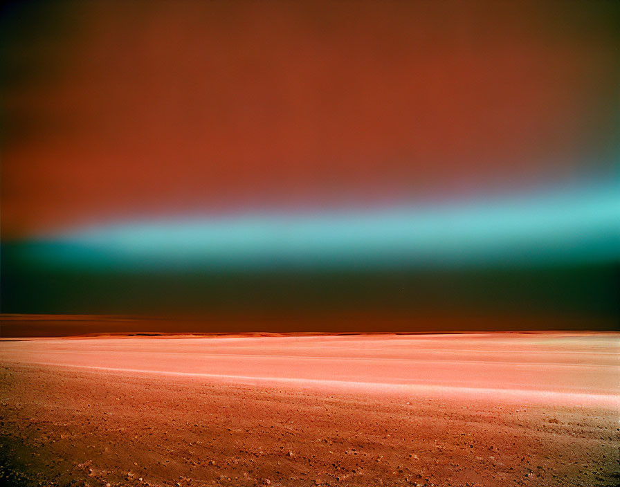 Reddish rocky Mars landscape under gradient blue sky