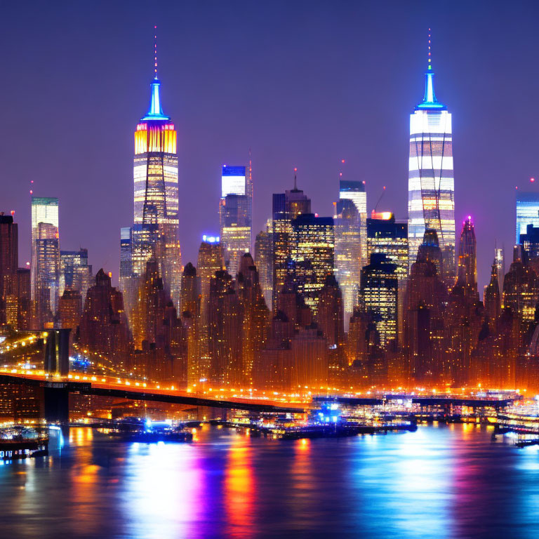 City skyline at night with illuminated skyscrapers and water reflections