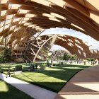 Contemporary architecture with wooden beams and glass panels in landscaped gardens