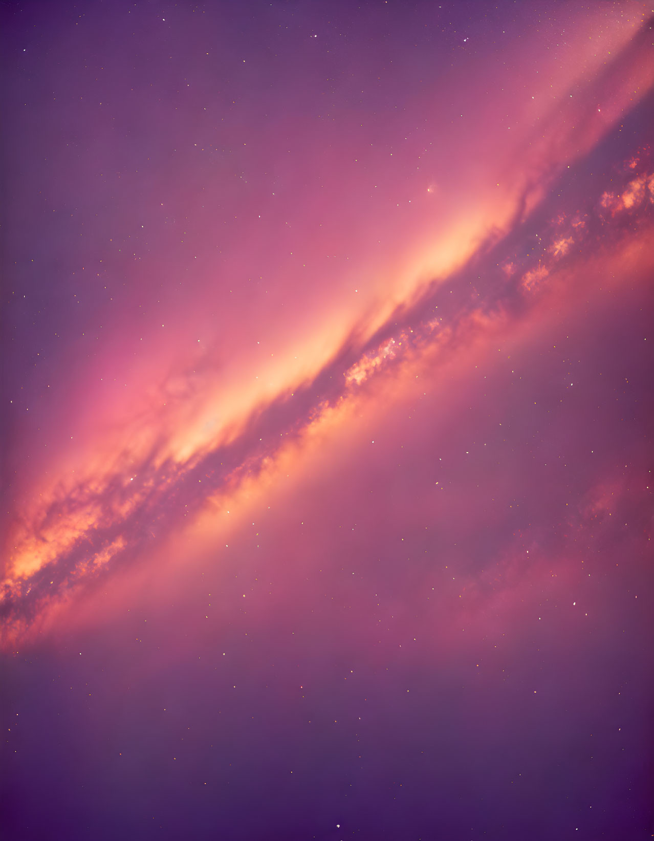 Purple-Hued Sky with Luminous Cloud-Like Formations