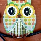 Colorful Stylized Owl Illustration with Blue Eyes and Feathers Tapestry