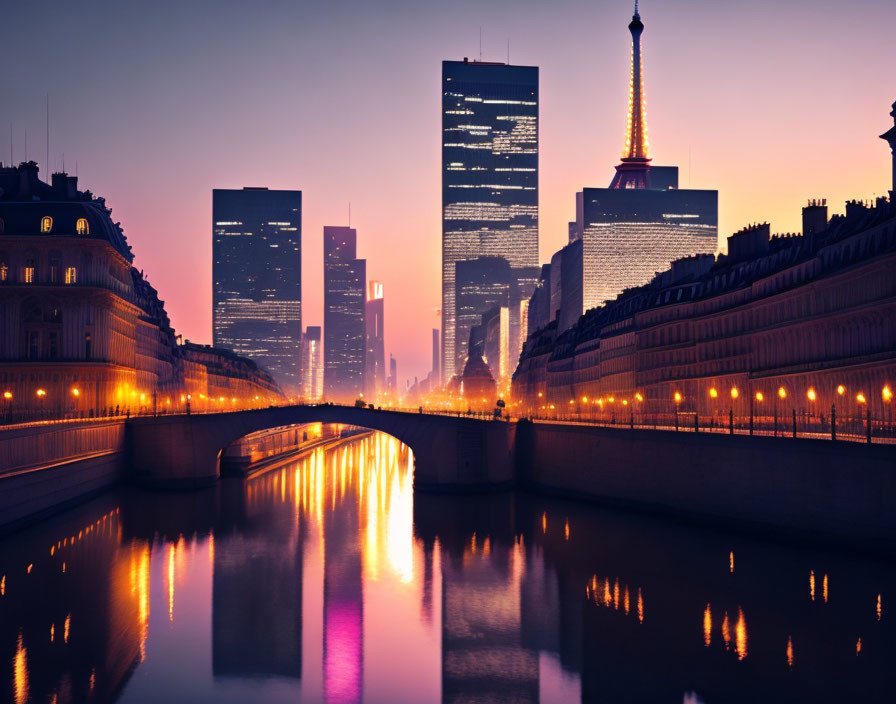 Cityscape with Eiffel Tower and skyscrapers reflected in river at twilight