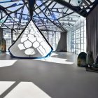 Geometric Glass Pyramid in Modern Room