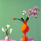 Bold orange vase with stylized flowers on green background.