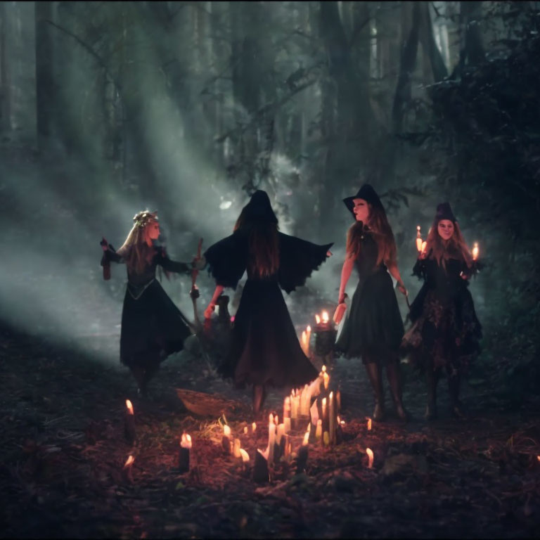 Four witches in mystical forest with candles and lanterns