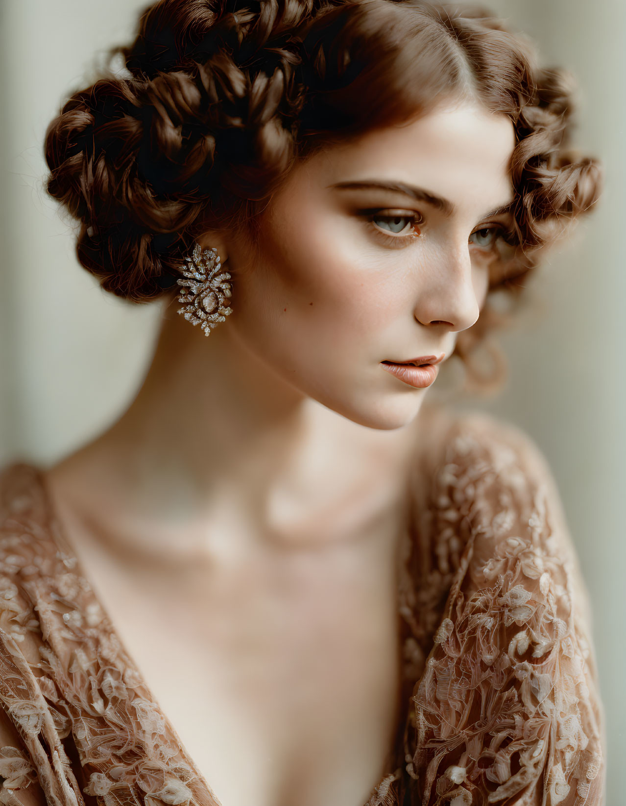 Vintage elegance: Woman with braided hair, ornate earring, and lace dress gazes sideways