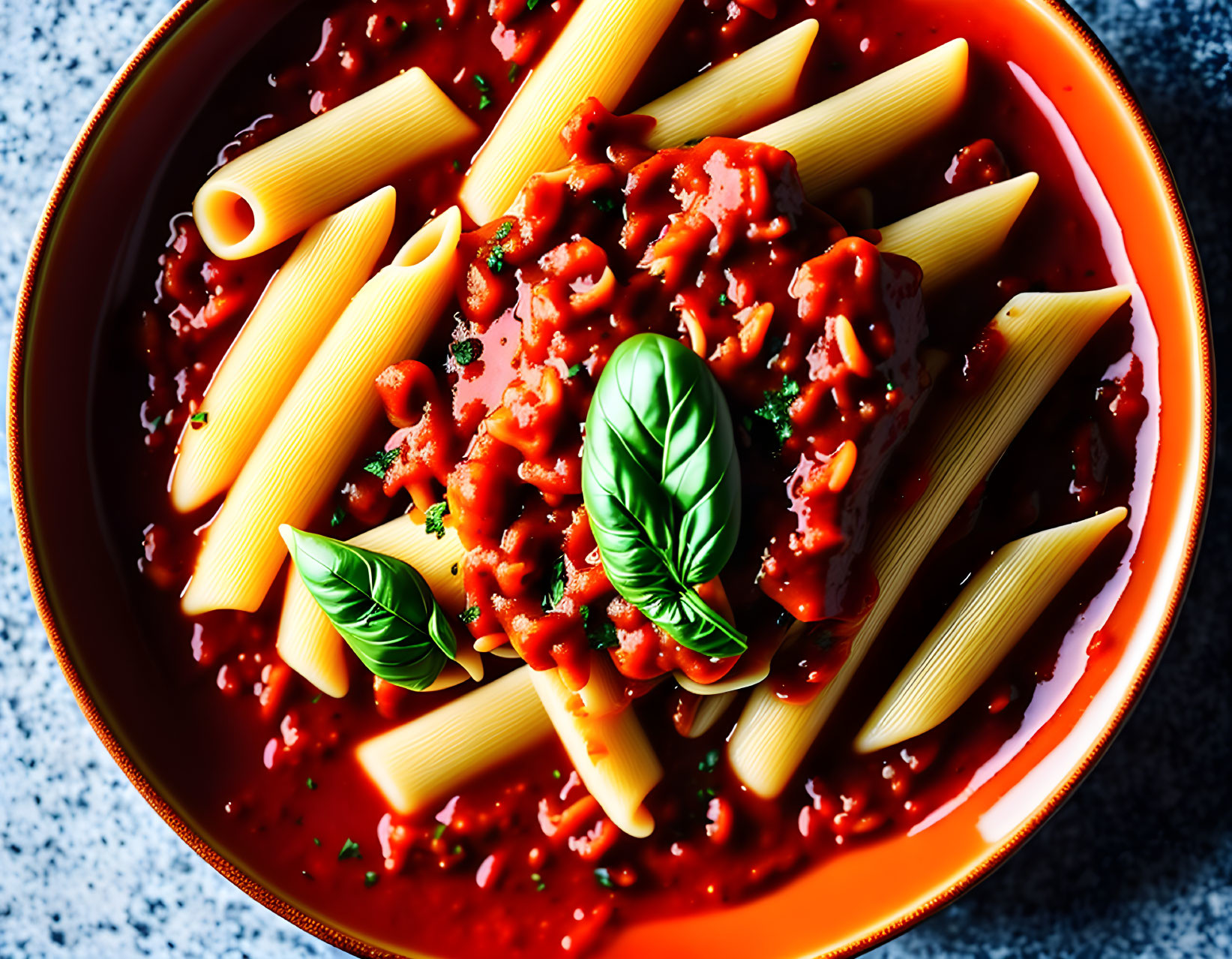 Italian Pasta Dish with Tomato Sauce and Basil Leaves