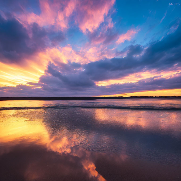 Tranquil Beach Sunset with Purple and Orange Clouds