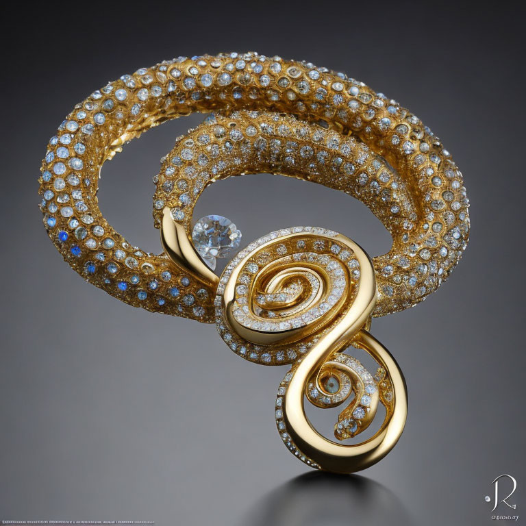 Spiral-shaped brooch with diamonds and center stone on reflective surface
