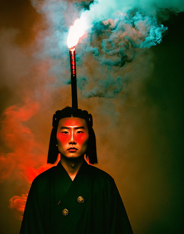 Traditional East Asian person with lit torch in dark attire on red backdrop