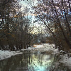 Tranquil fantasy landscape with old stone bridge, river, autumn trees, boats, and misty