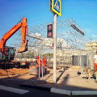 Vintage fairground scene with carousel and kiosk under blue sky