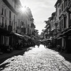 Traditional Street with Old Houses and Shops in Sunlight