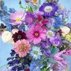 Colorful Watercolor Painting of Blooming Flowers in Purple, Pink, and Blue