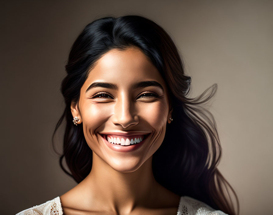 Woman with beaming smile in white outfit on beige background