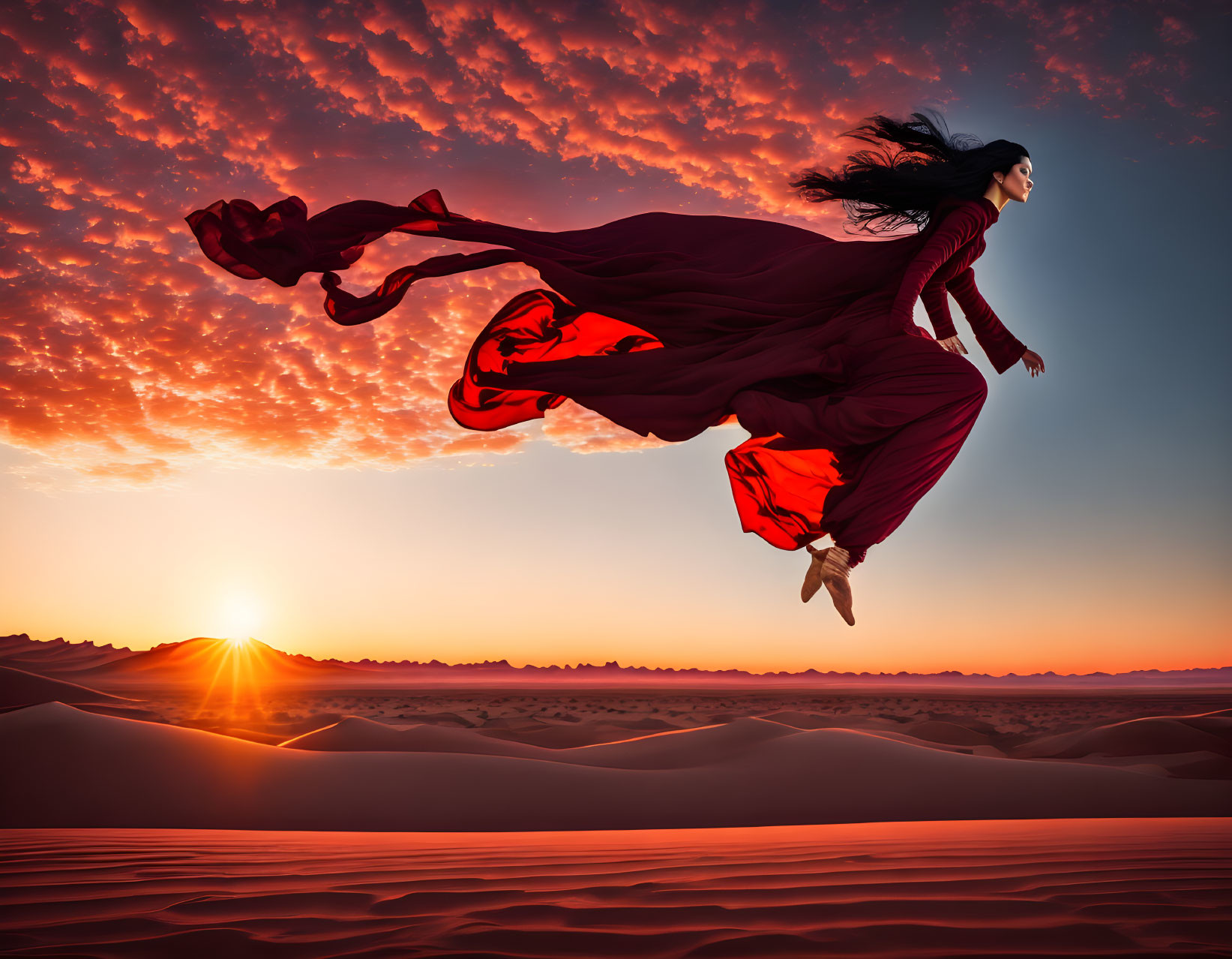 Person in Red Dress Levitating Above Desert at Sunset