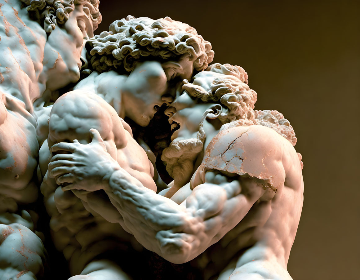 Detailed Close-Up of Classical Sculpture: Muscular Male Figures in Embrace