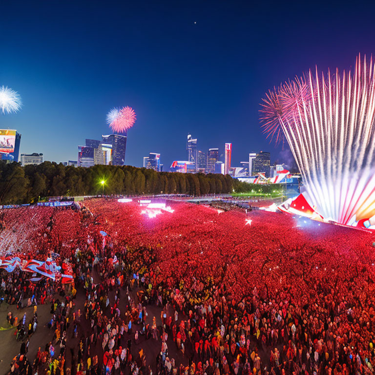 Outdoor Concert with Fireworks Over City Skyline